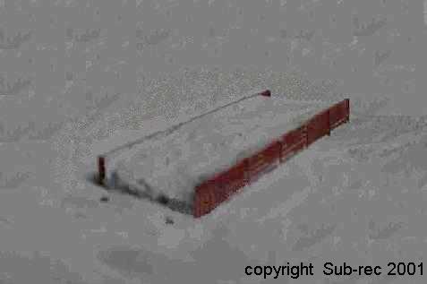 épave wagon, l'un des deux wagons posés à plat